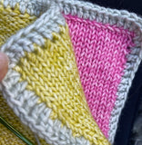 Hold right sides together then crochet the squares together 