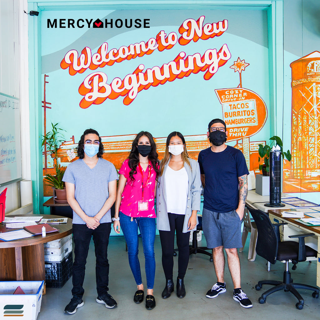 meriwool layers crew with the mercy house after a merino wool donation to the homeless
