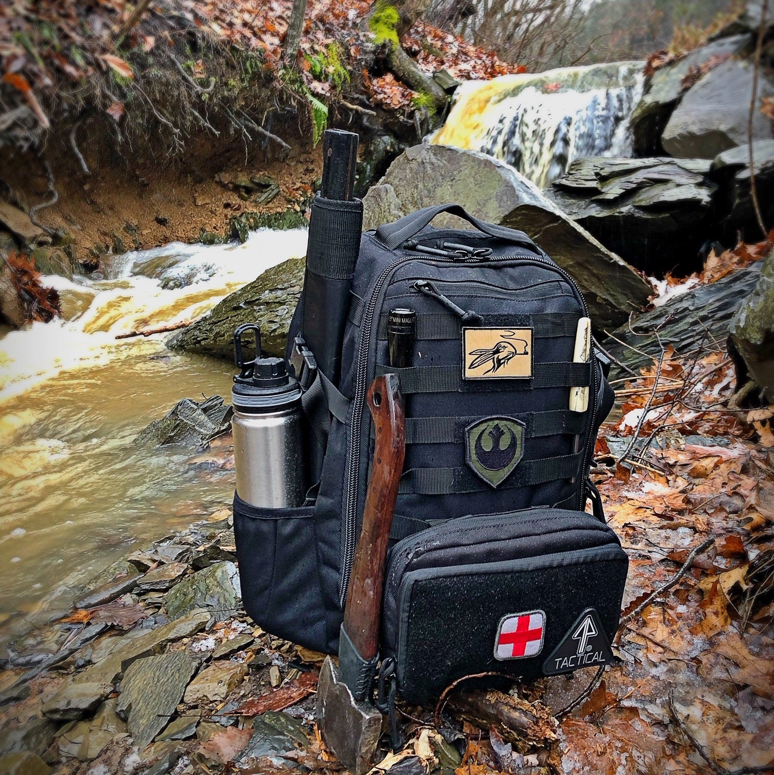 14er Tactical Backpack with molle accessories in the woods