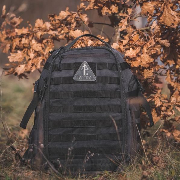 The 14er Tactical Backpack has MOLLE compatible straps to which you can secure a camera holster or bag.