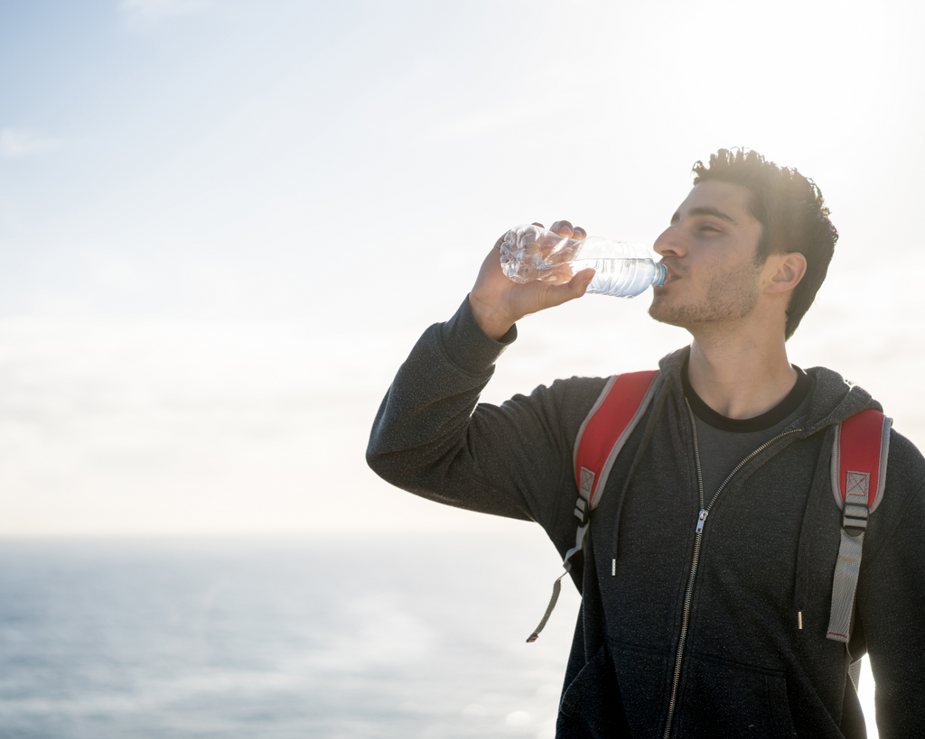 Hydration tips for hiking: Start your hike with a fully filled water bottle and be prepared to filter and purify water in case you have need of a refill.