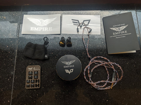 Empire ears legend evo IEM, bone conduction, balanced 4.4mm headphone cable, ear tips, carrying case, mesh pouch, stickers, instruction manual  