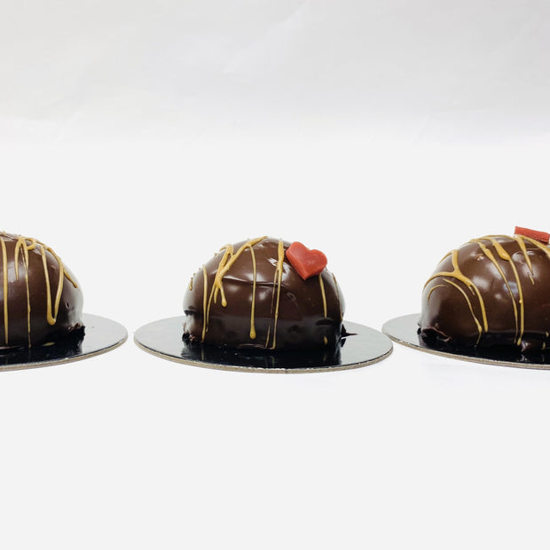 Chocolate Mousse Bomb, Dipped in Strawberry Ganache