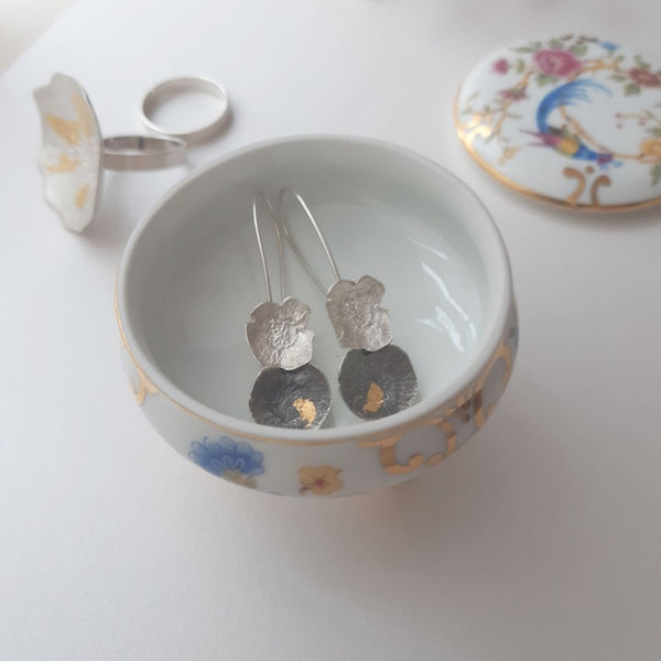 Tinket box with silver earrings