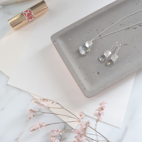 Silver jewelry stored on a tray