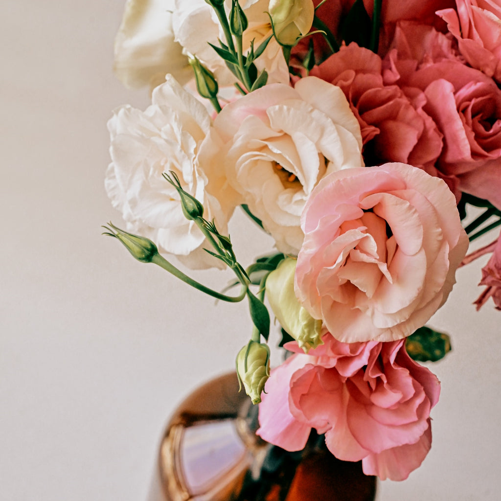 pink and white lisianthus in a vase
