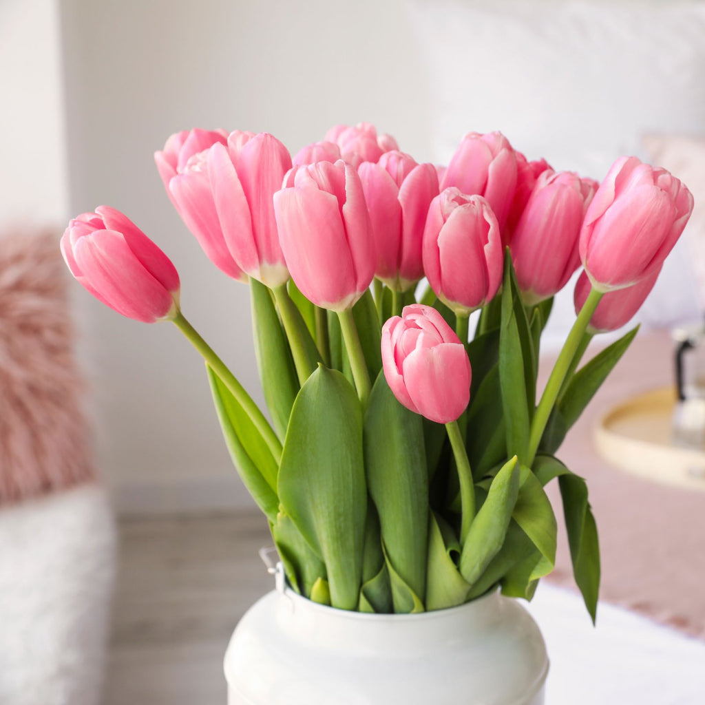 pink tulips in vase flowers for housewarming