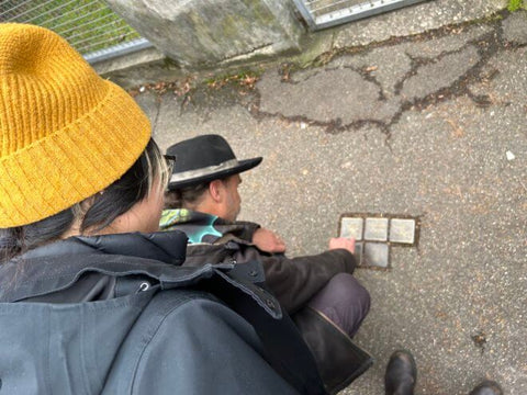 With my 25-year-old kid Maya, looking at bronze plaques in front of our ancestral home in Heilbronn that memorialize the murder of Franziska and Berthold in the holocaust.