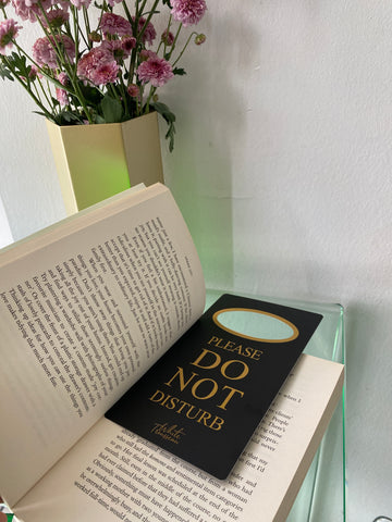 Using our do not disturb sign as a bookmark