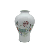 Vintage Le Pavillon de la Porcelaine vase made by Limoges. White porcelain with a floral and bird design.