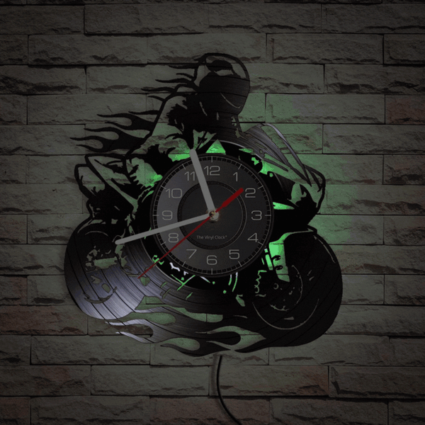 Looking for a unique and stylish way to upgrade your decor? Check out our Cycolinks Professional Motorbike Rider Vinyl Clock! This clock features a stunning design showcasing a BMX biker executing a Nac Nac jump. Made from recycled vinyl, this clock is not only eco-friendly, but also boasts silent and energy-efficient LED lighting with 7 color options, which can be easily controlled by a remote. A great gift for bike enthusiasts, this clock comes with our 30-day replacement policy. Order now and add a touch of adrenaline to your home or office!