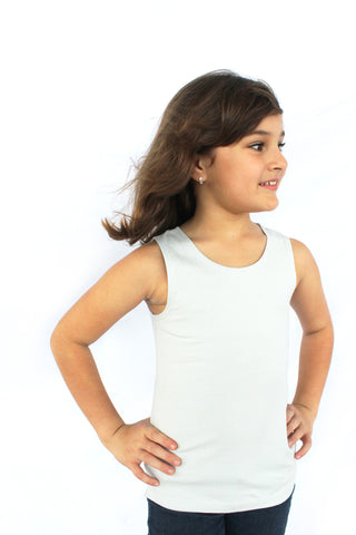 little girl wearing a baby blue tank top . she is posing with her hand on her hips, she is very pretty
