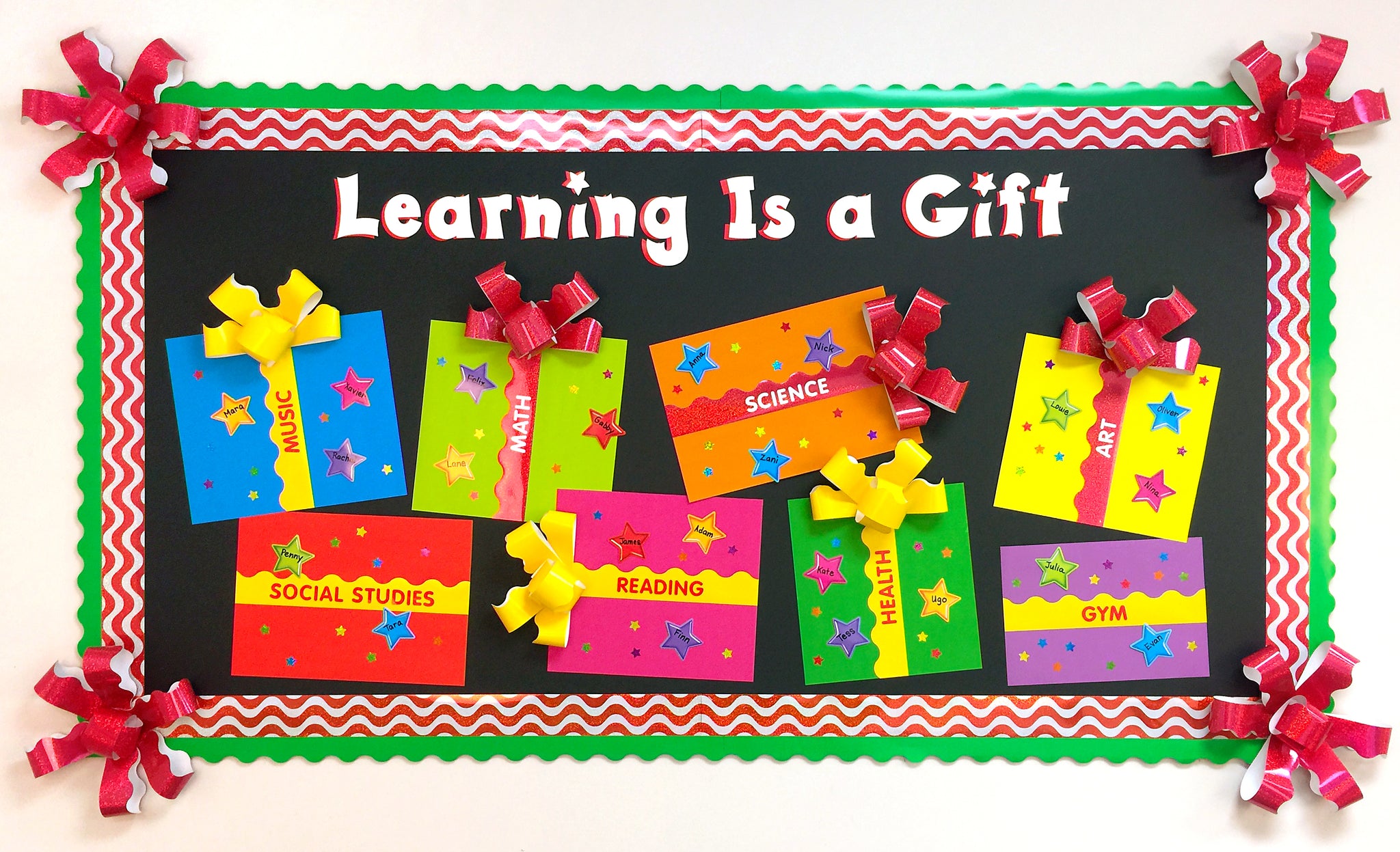 Learning is a gift Christmas holiday bulletin board idea.