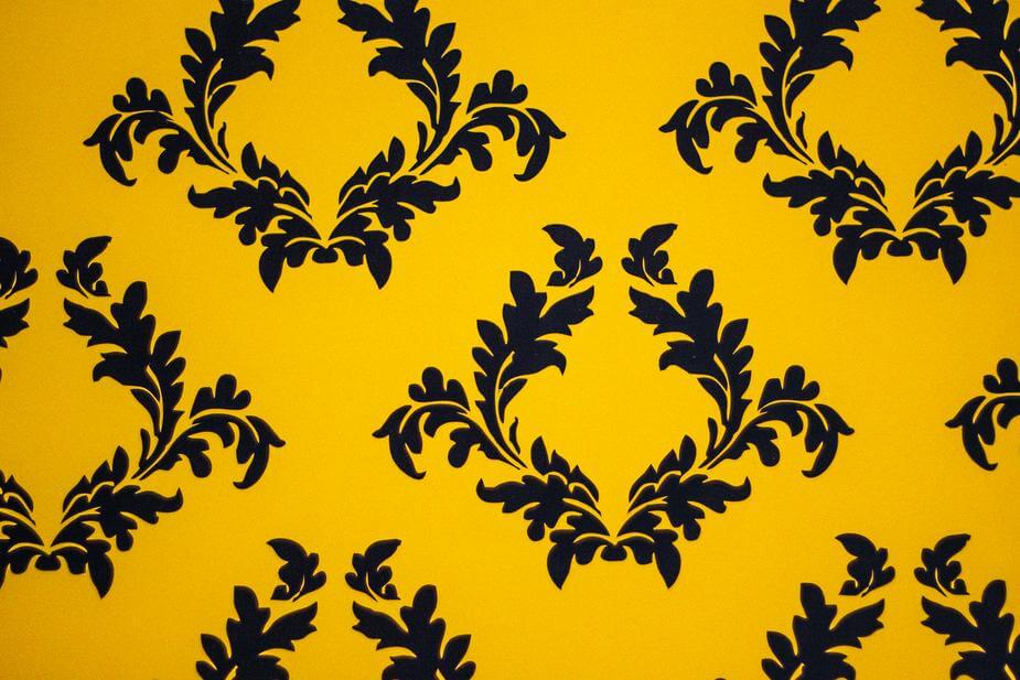 Yellow background with black filigree pattern