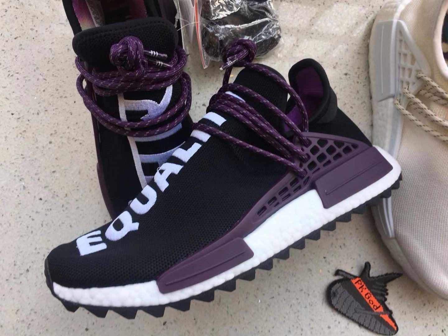 Human Race Pharrell Holi Festival Core Black – titanstockpilez