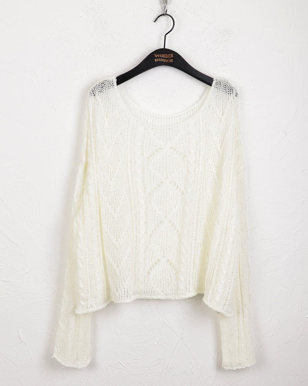 Erpi wave punching see-through lip neck long sleeve knit