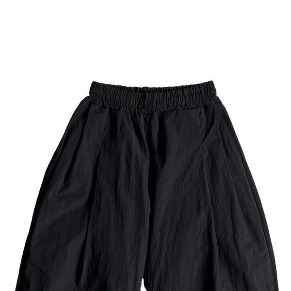 Over pin-tuck nylon pants