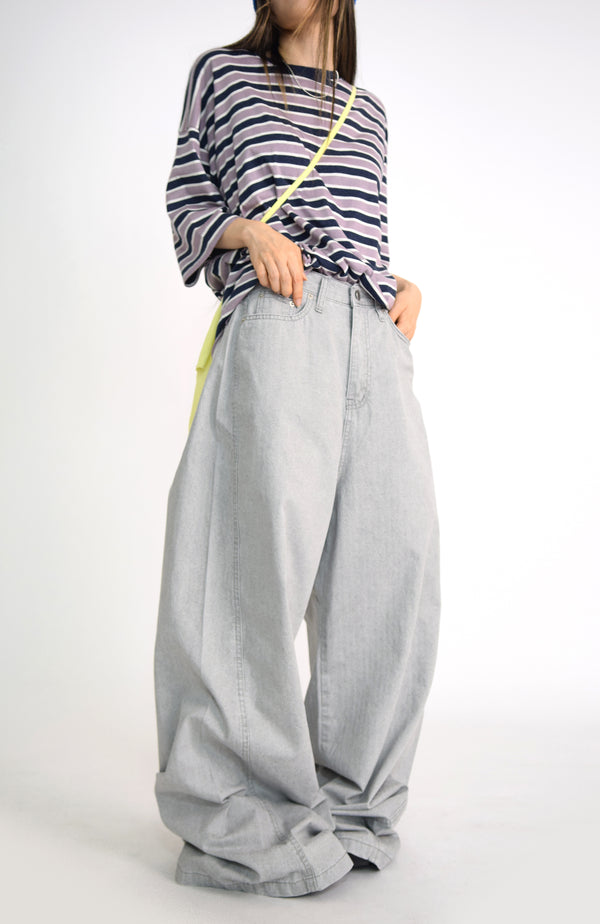 over wide gray pants