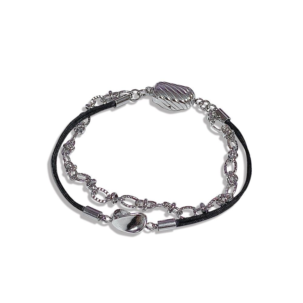 All surgical steel wave layered cord bracelet