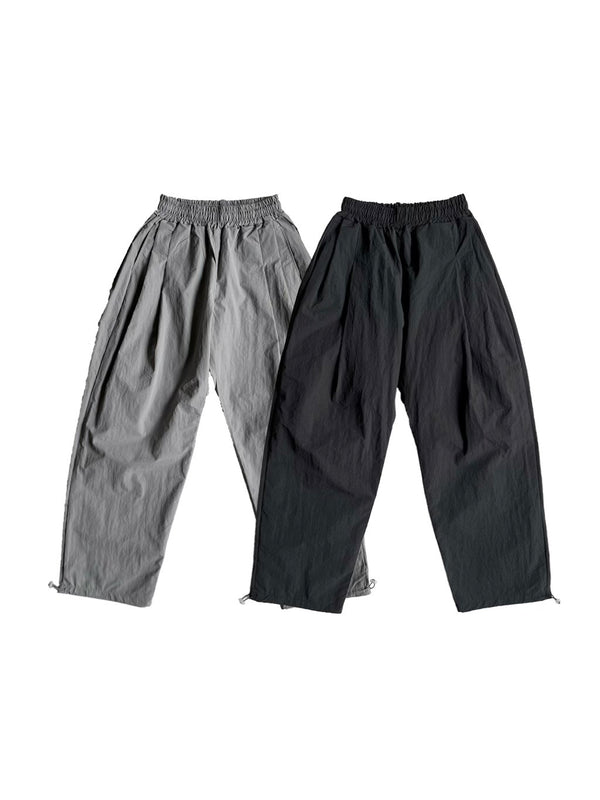 Over pin-tuck nylon pants