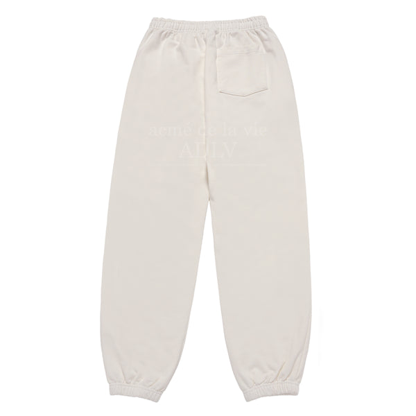 24FW ROUND SCRIPT BOUCLE LOGO PANTS CREAM