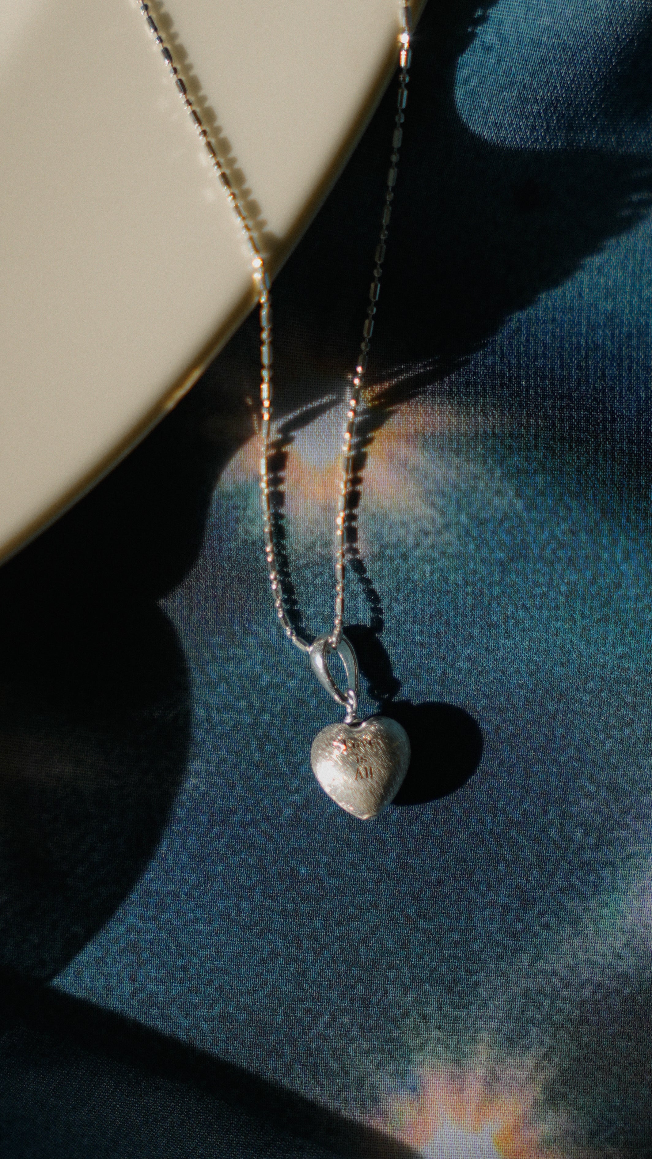 Love is all, silver necklace