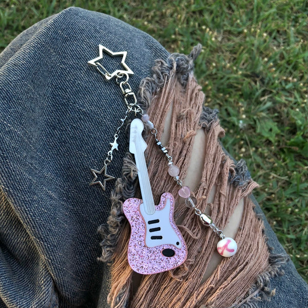 band's pink guitar