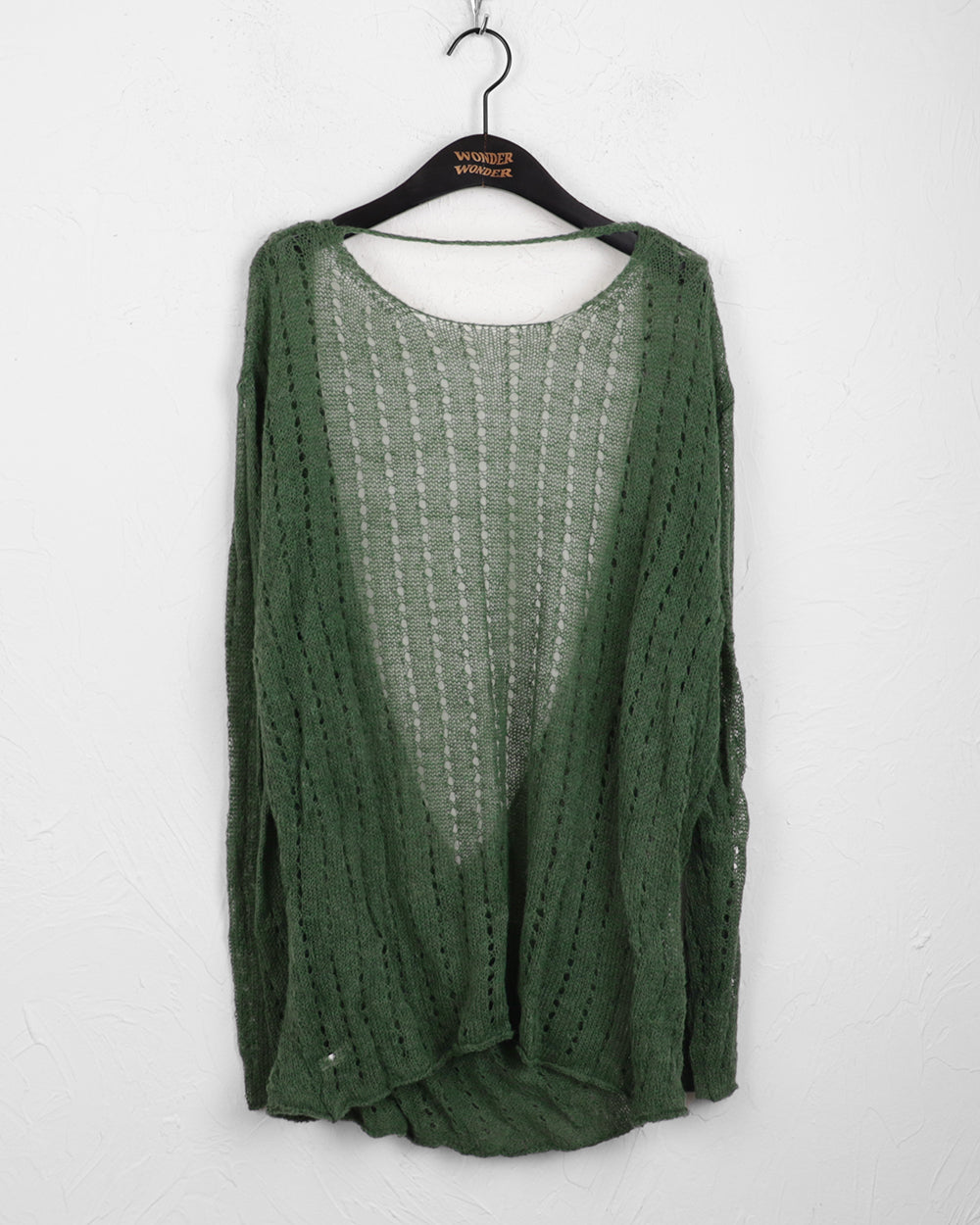 Conkle back-opening strap wrap punching layered long sleeve knit