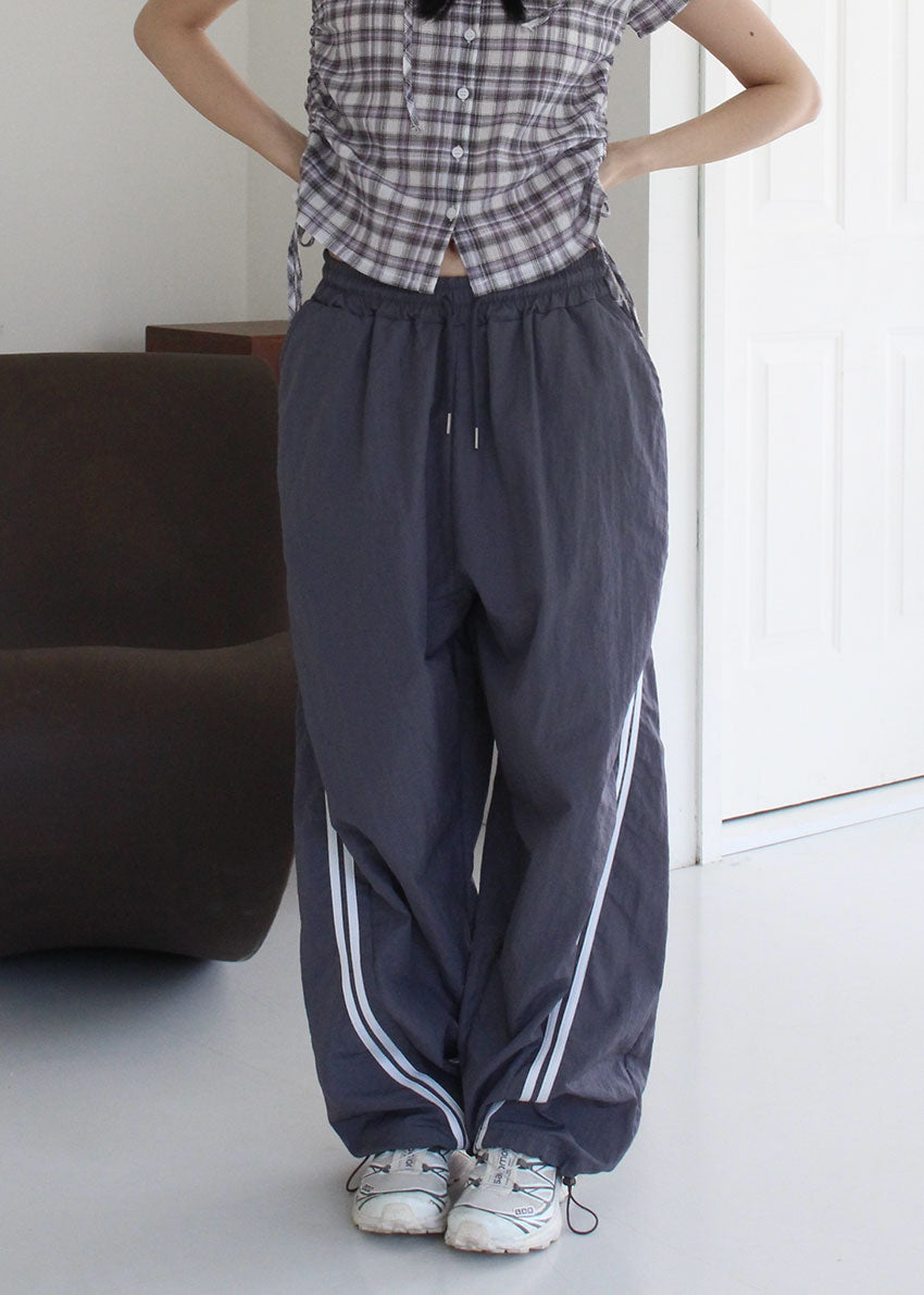 DIAGONAL TRACK LINE PANTS