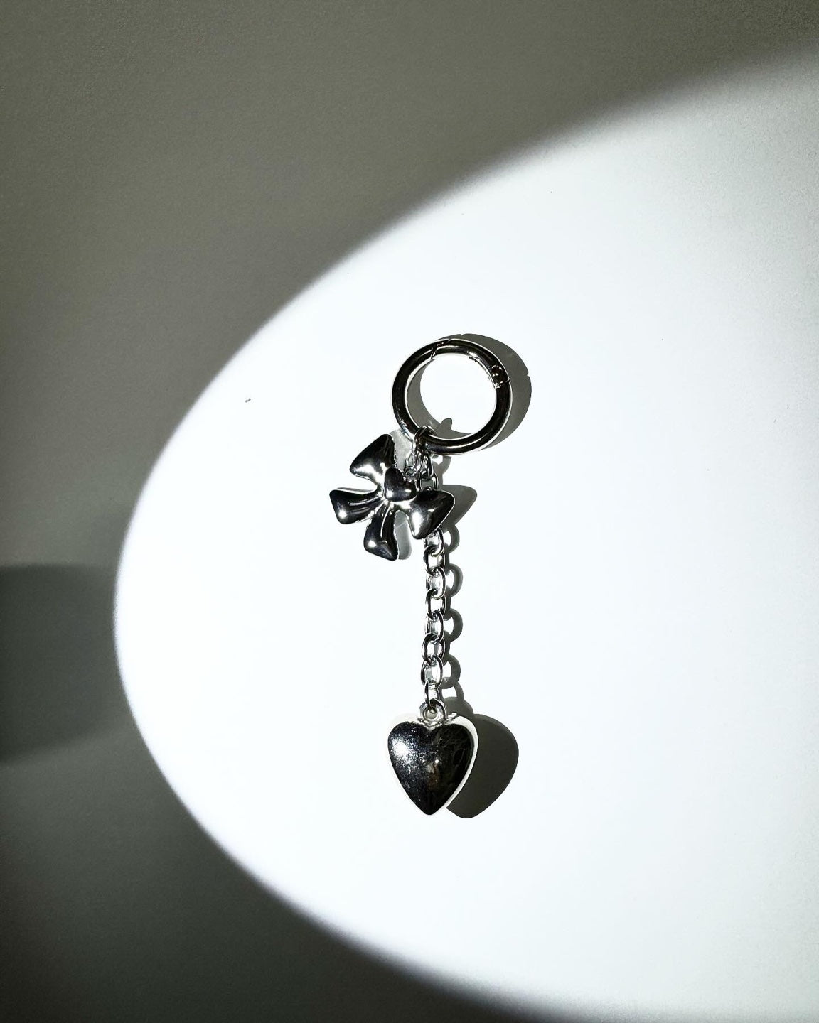 Silver ribbon heart drop keychain