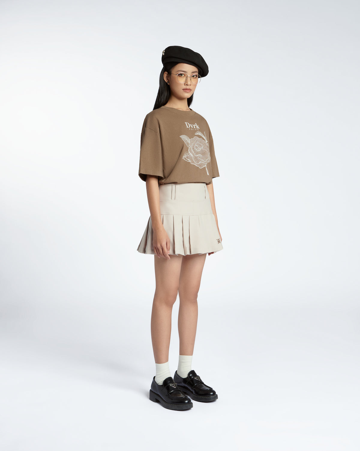 DVRK PRIVÉ LOW-RISE PLEATED MINI SKIRT - CREAM