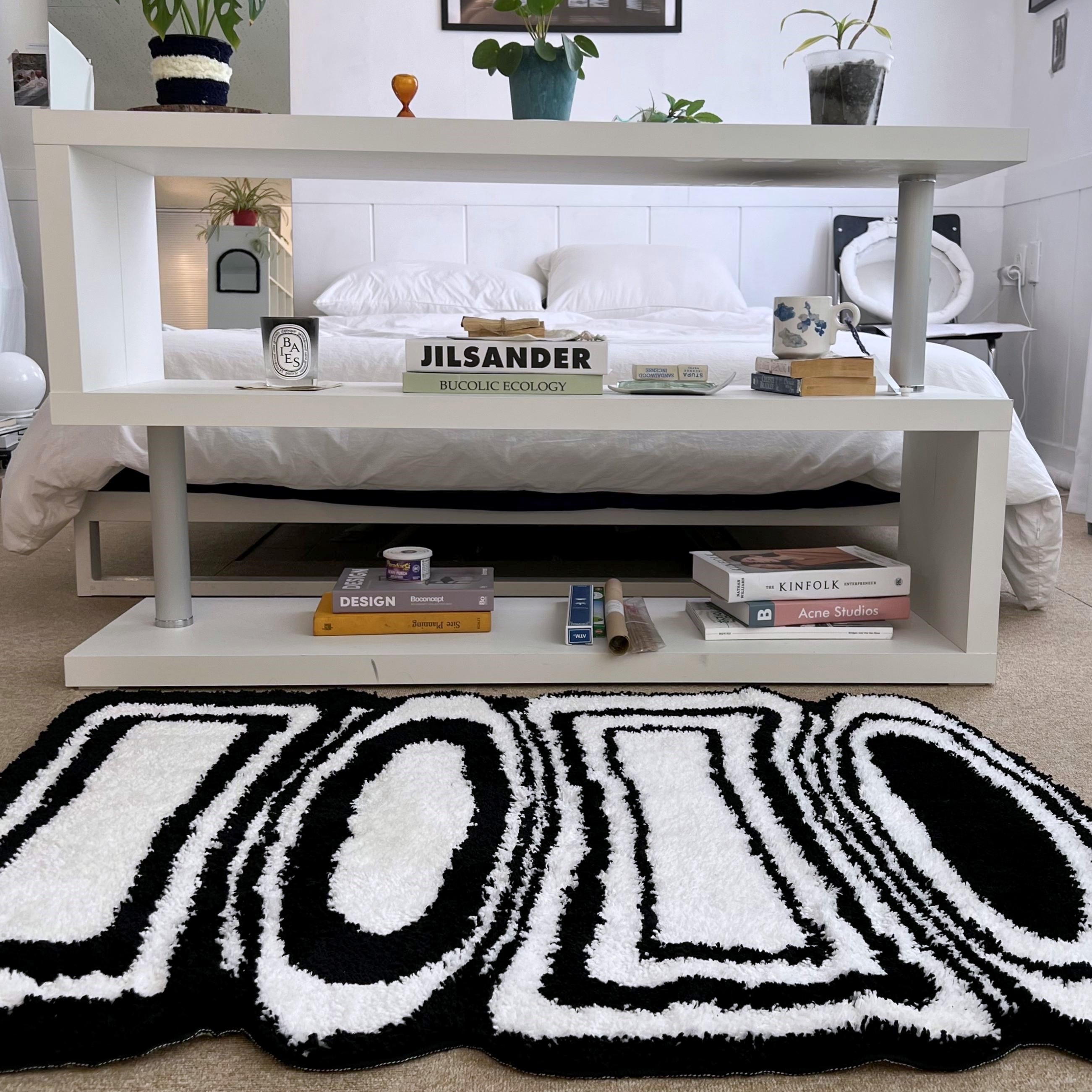 Black & white oval square tufting rug