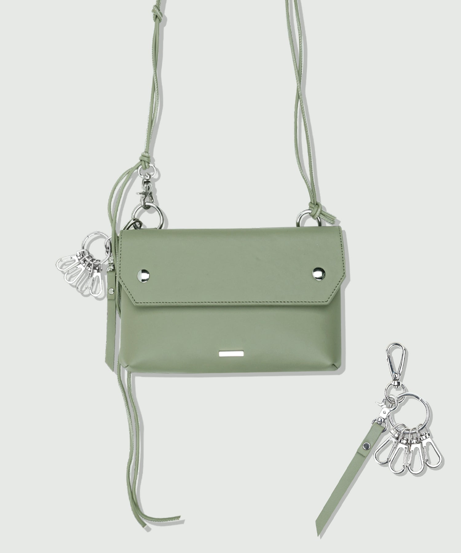 piping leather strap flap bag & utility key ring basil