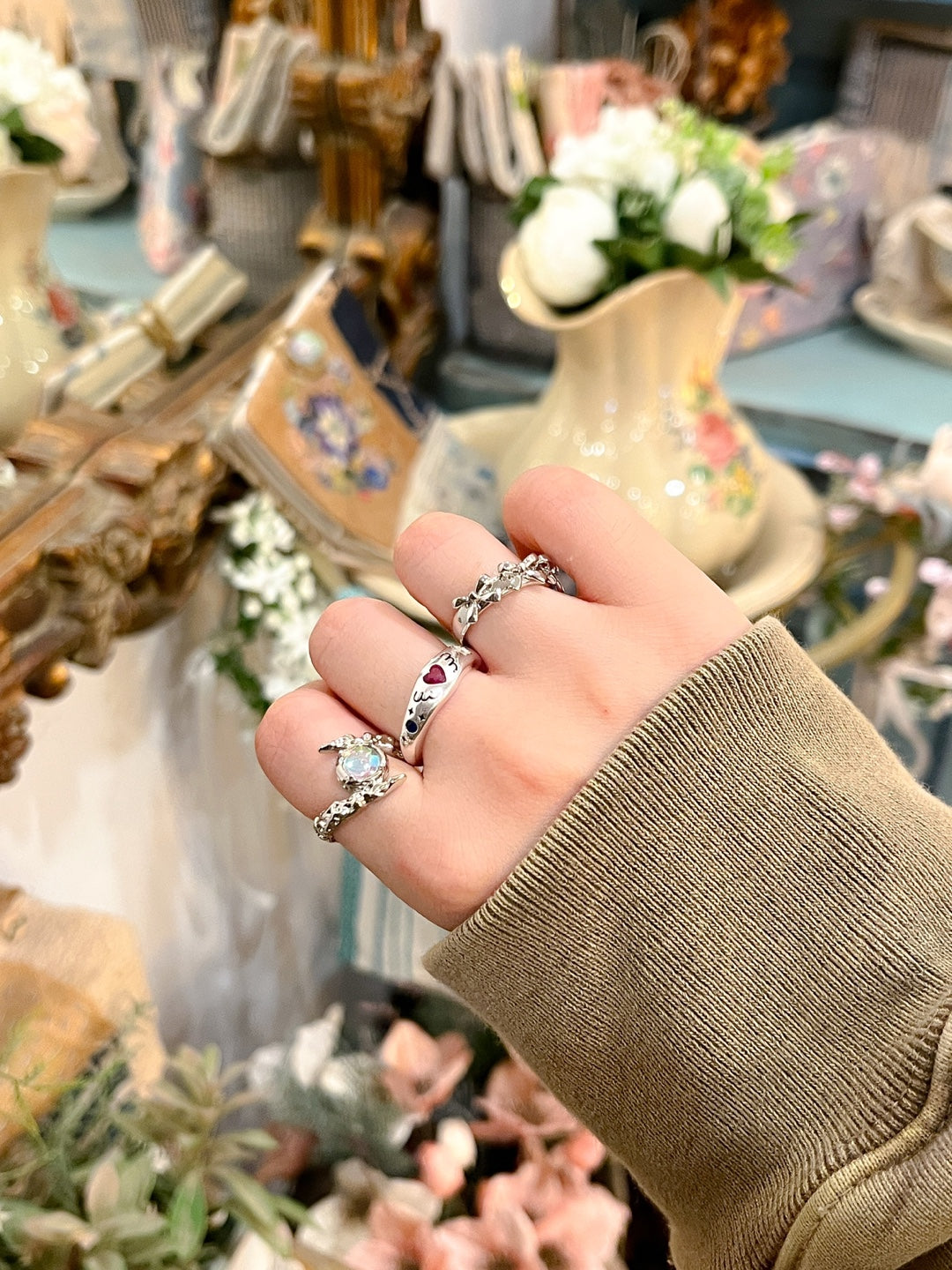 Silver pink angel beam ring