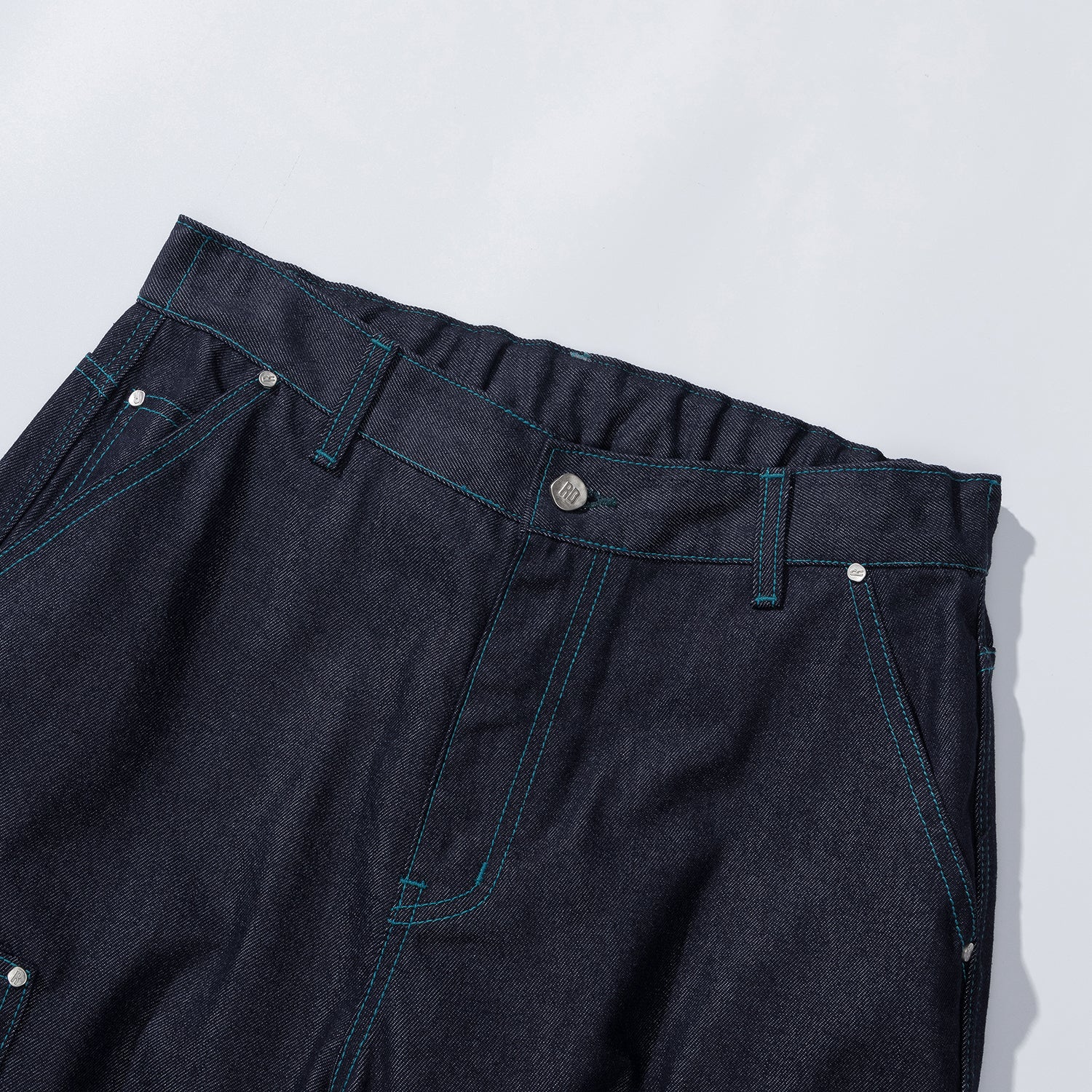 COLOR STITCH PANEL DENIM PANTS - INDIGO