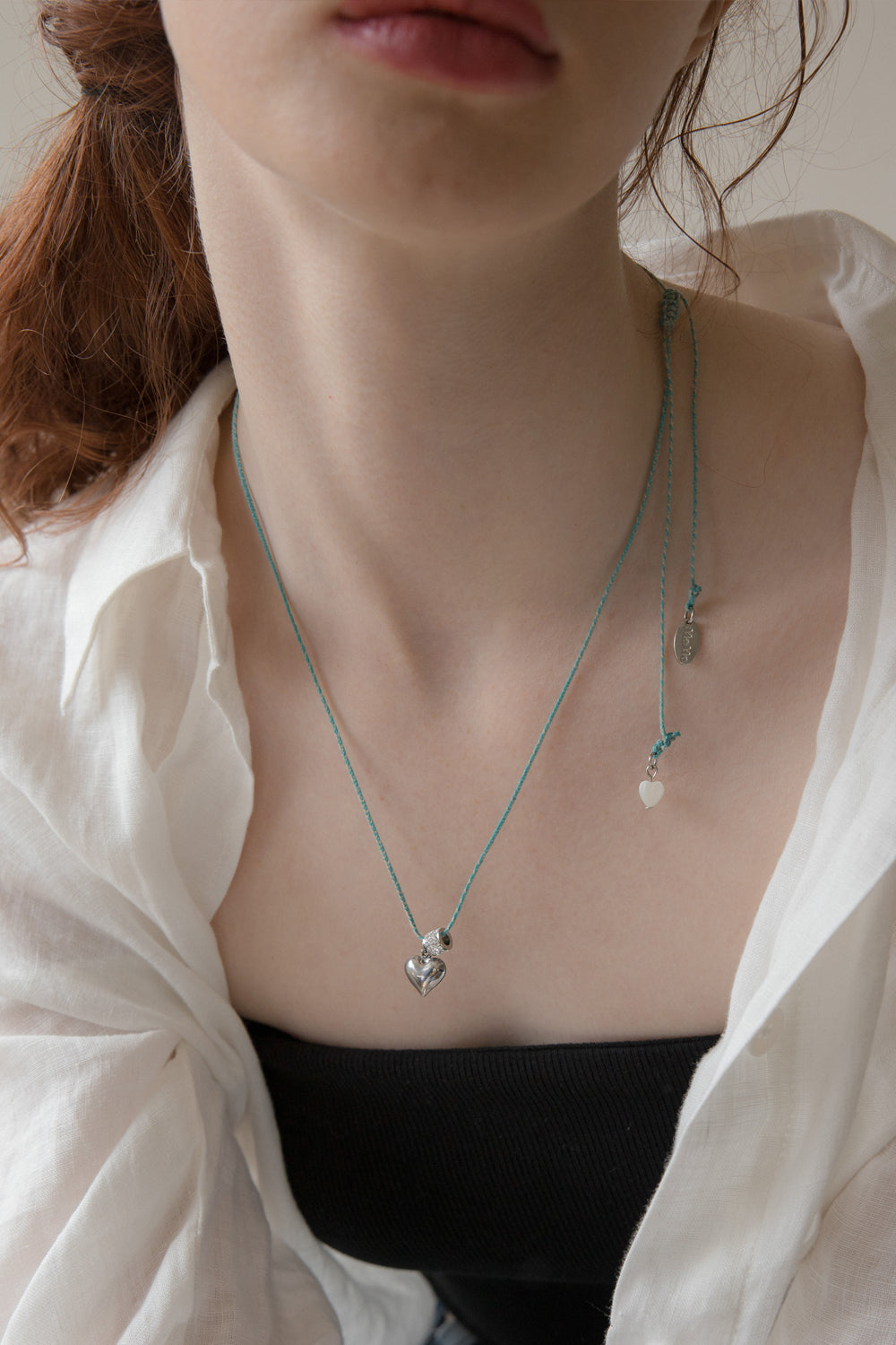 Heart point melange string necklace