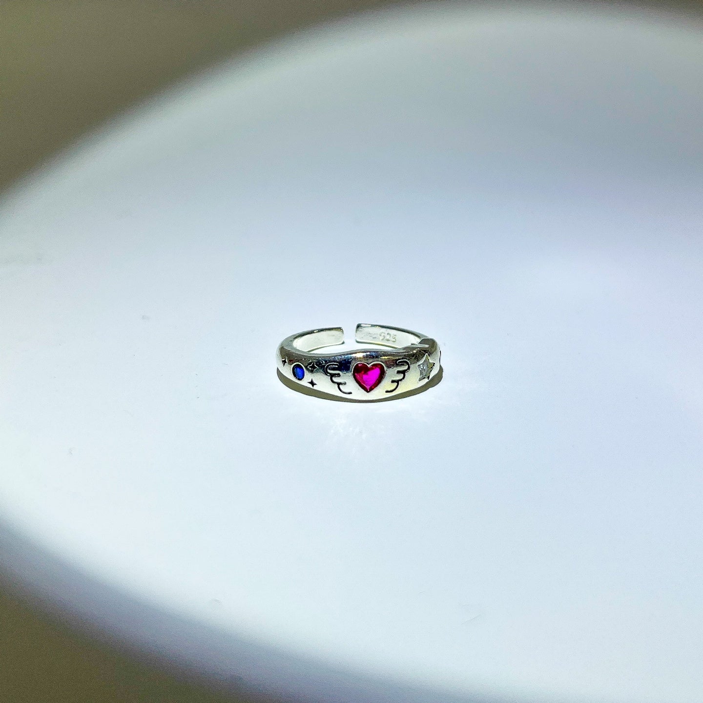 Silver pink angel beam ring