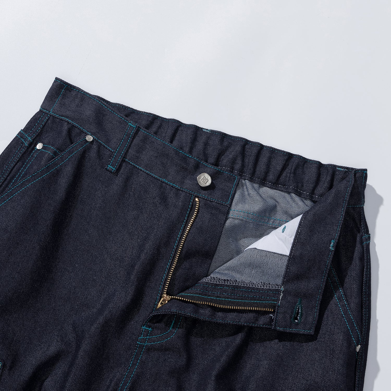 COLOR STITCH PANEL DENIM PANTS - INDIGO