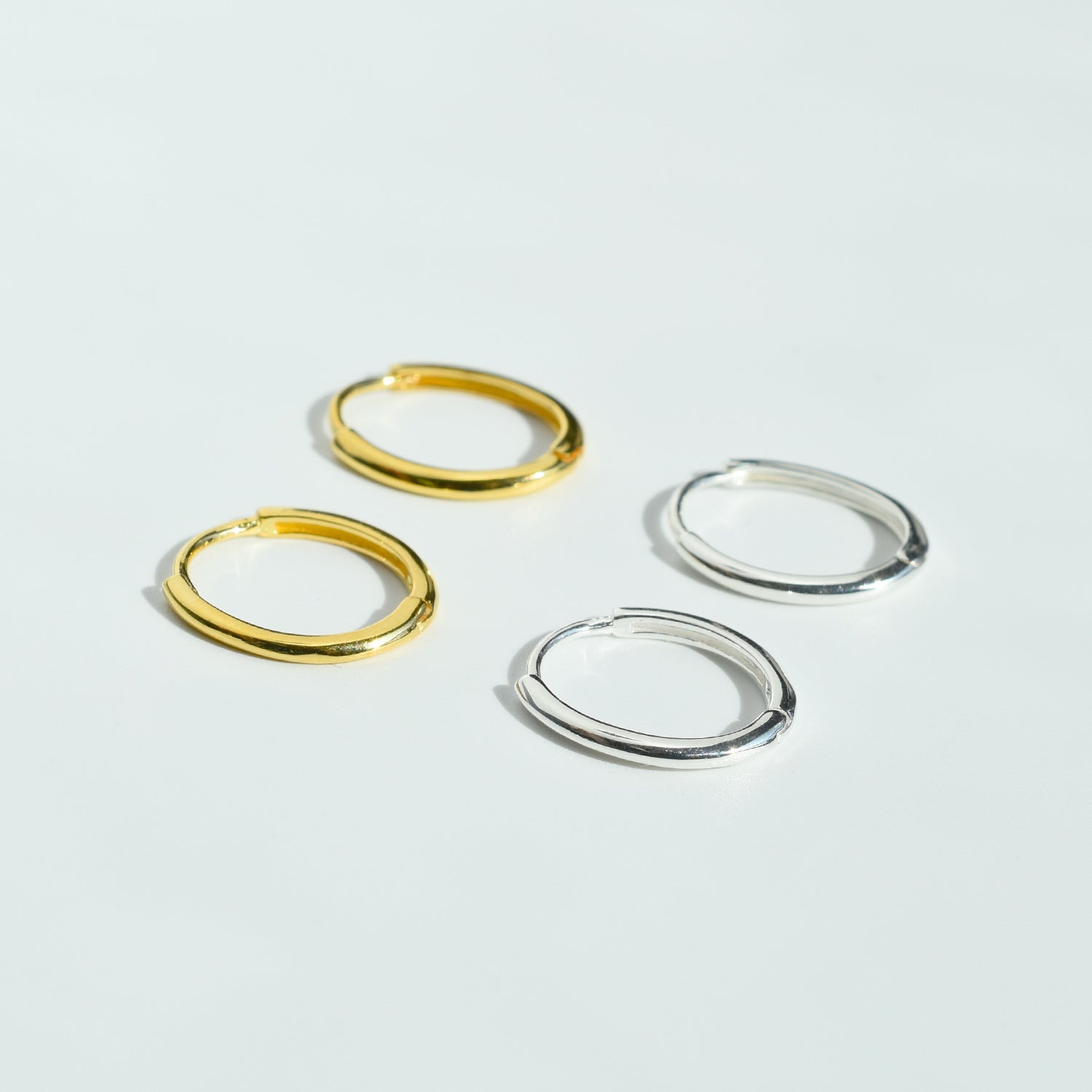 SKINNY OVAL HOOP EARRINGS