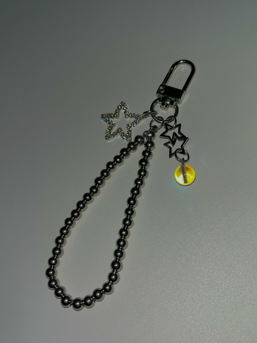 Silver star ball keychain