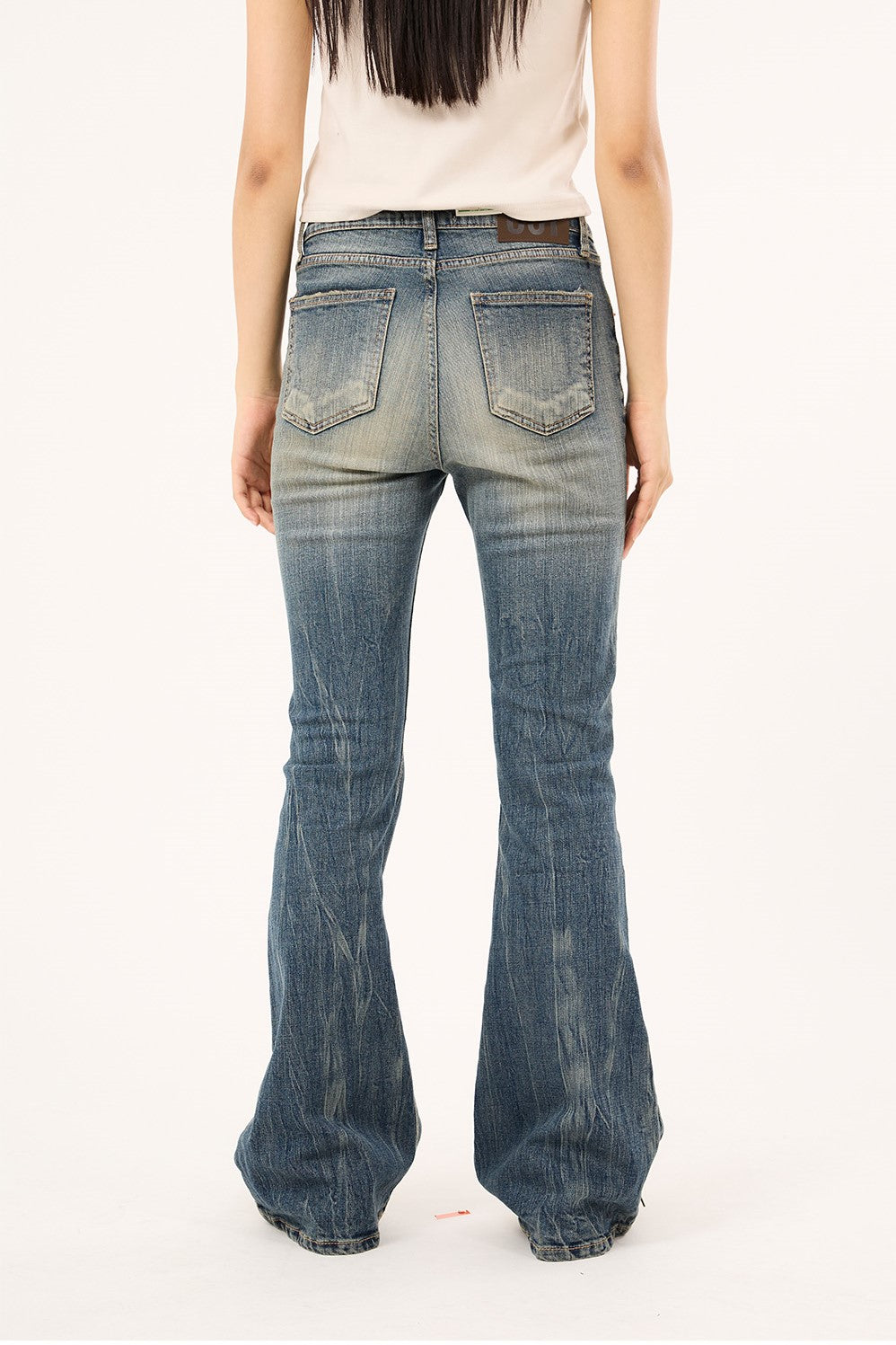 Wrinkle washed crack bootcut denim pants