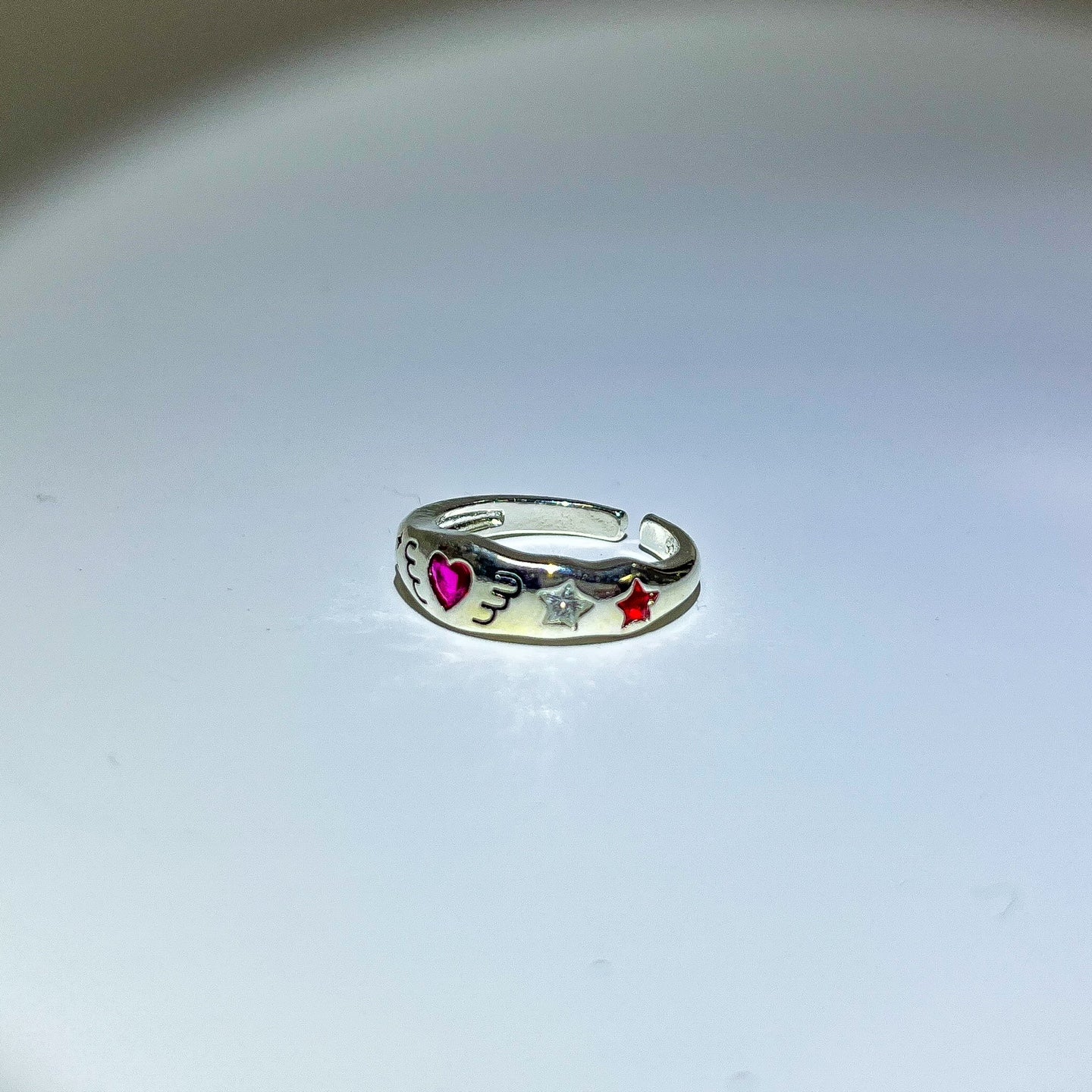 Silver pink angel beam ring