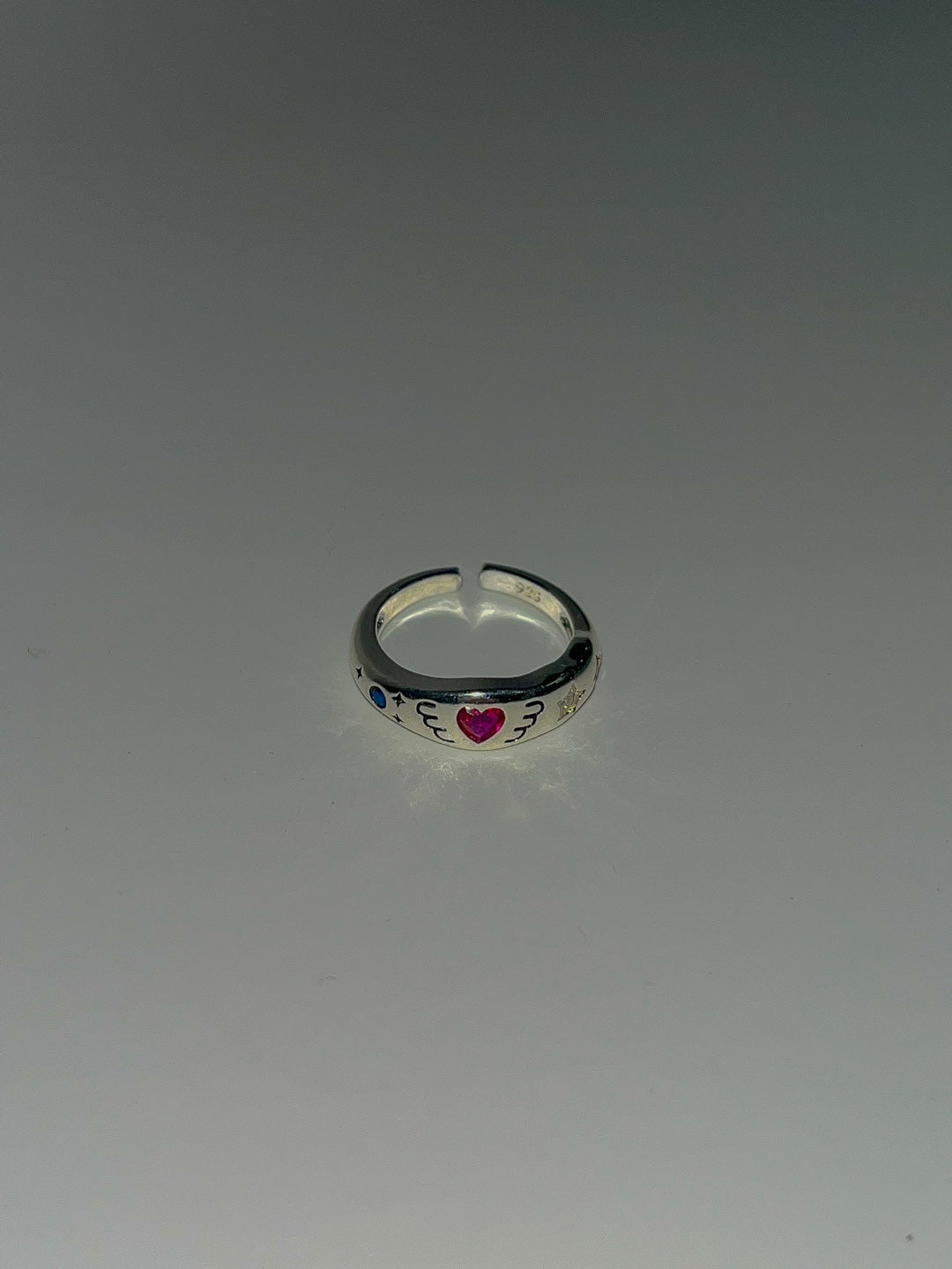 Silver pink angel beam ring