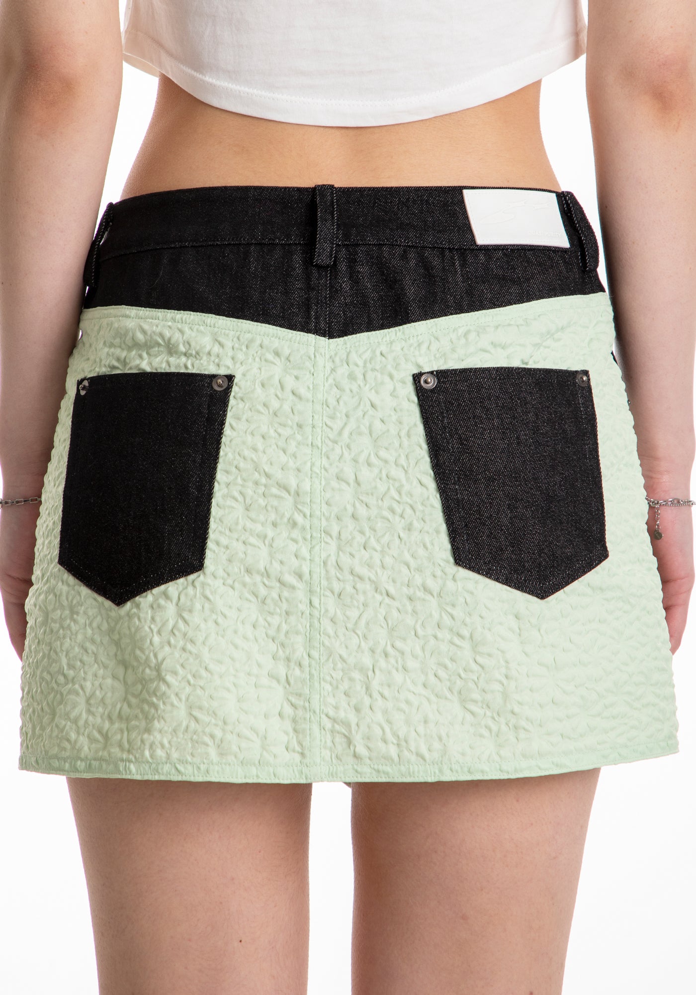 ASYMMETRIC BUTTON MINI SKIRT (MIXED FABRIC)