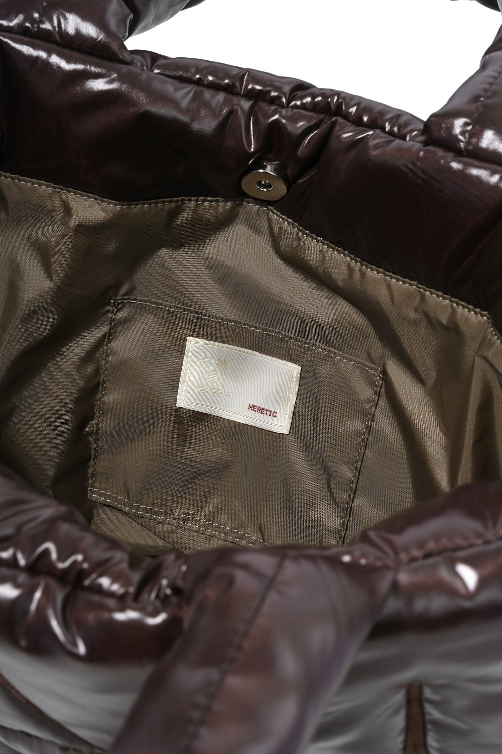 BROWN HERETIC PADDING BAG