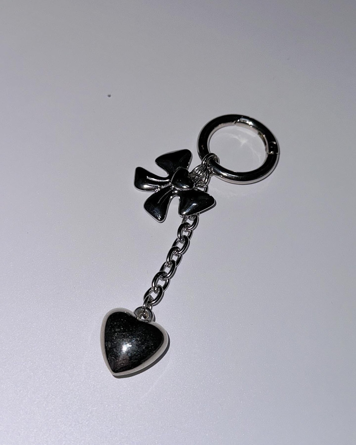 Silver ribbon heart drop keychain