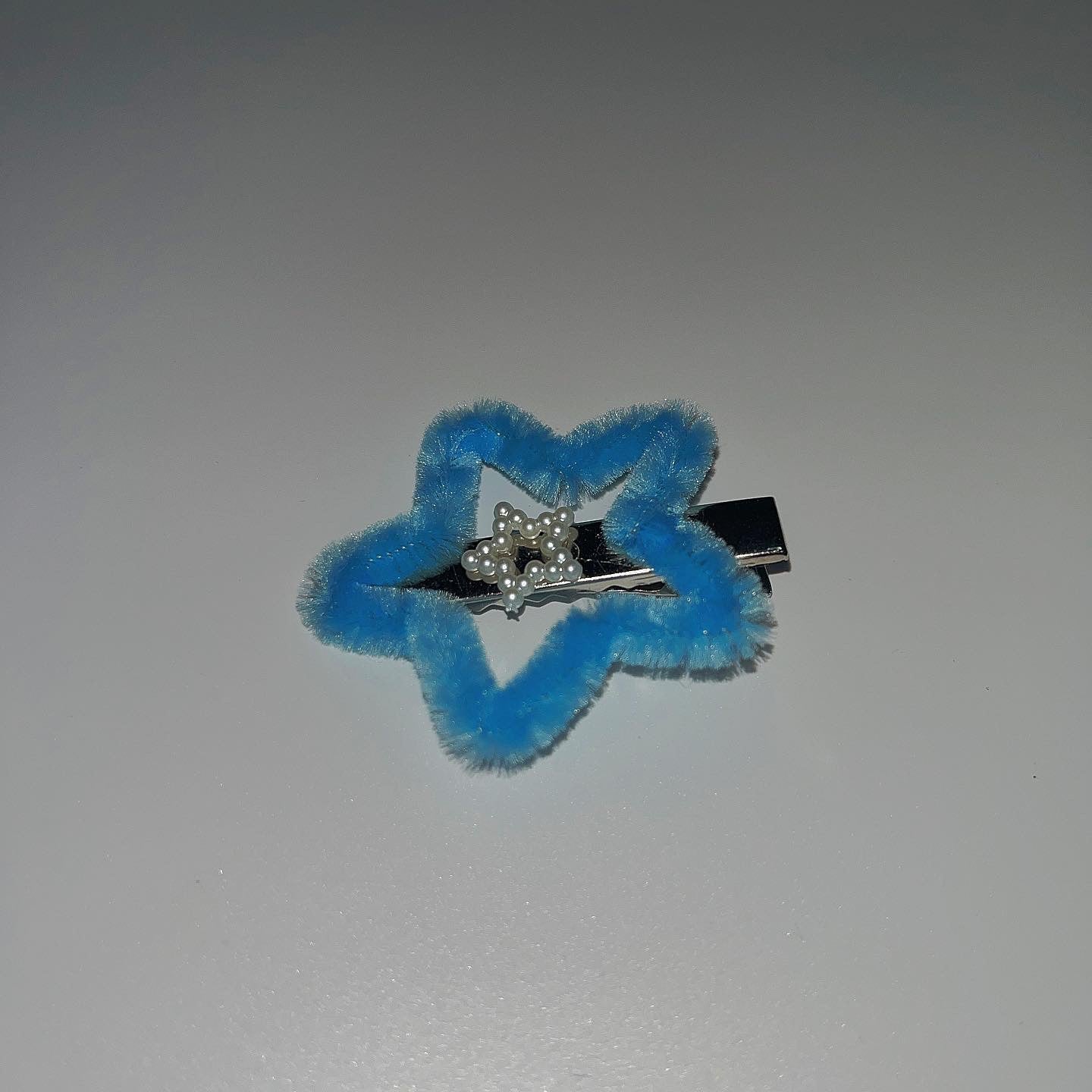 Blue baby fur hairpin