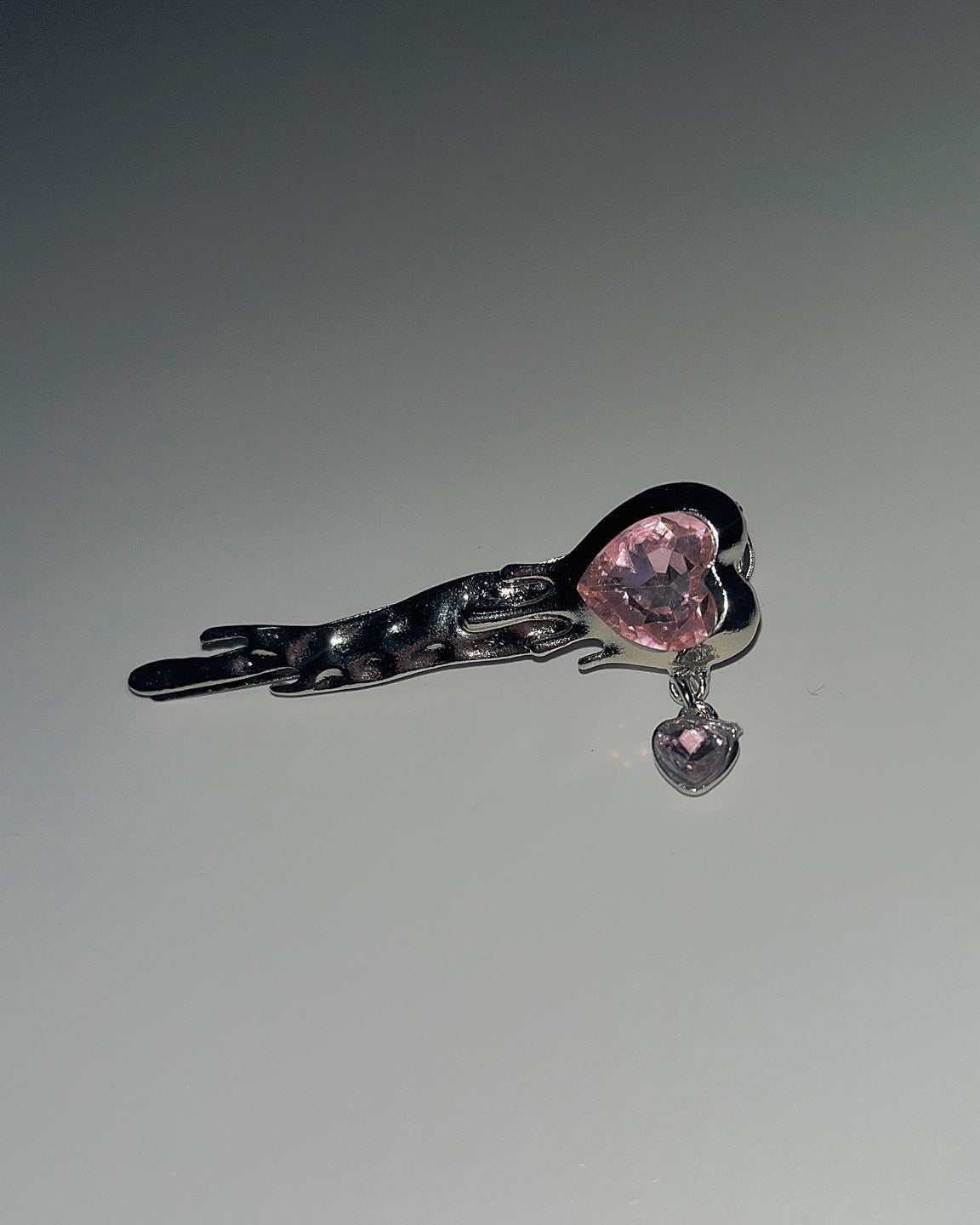 Melted pink heart hairpin