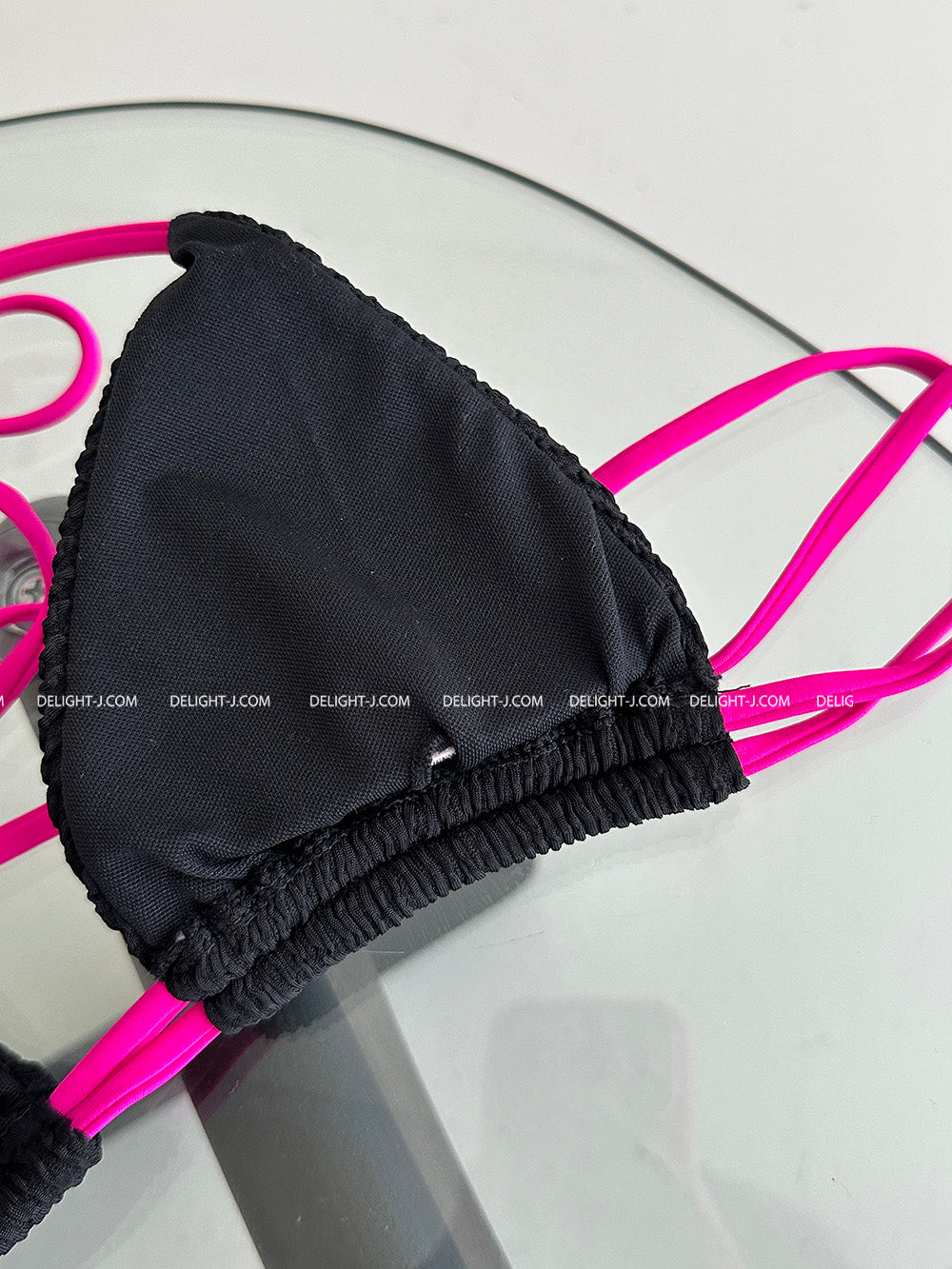 Hot pink colored string bikini