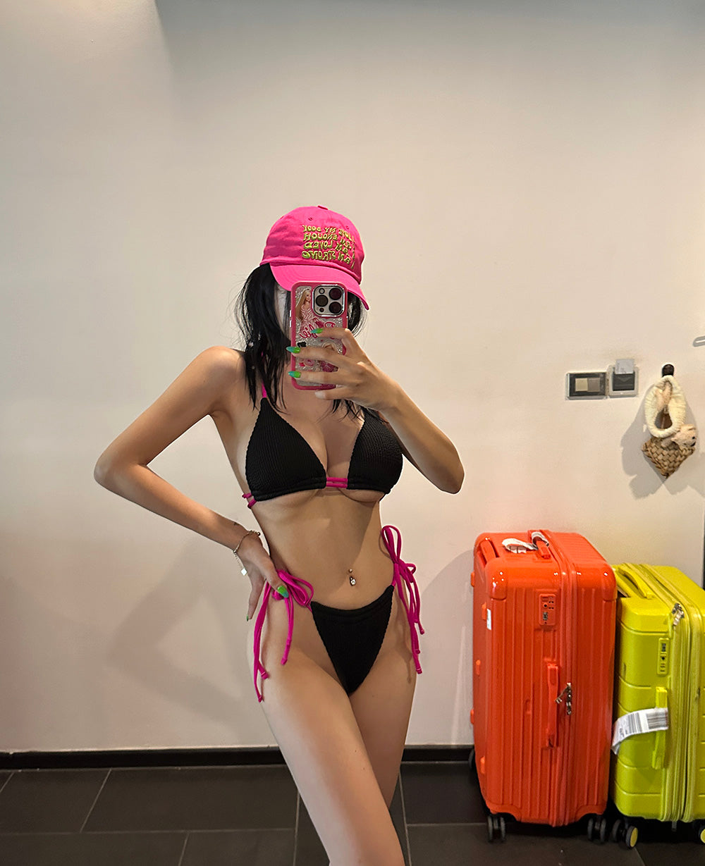 Hot pink colored string bikini